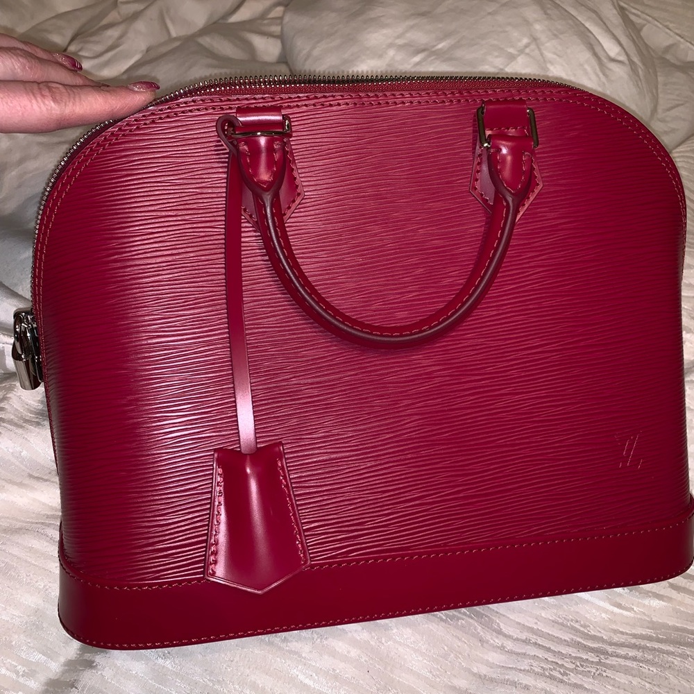 Louis Vuitton Alma mm bag. New never used.